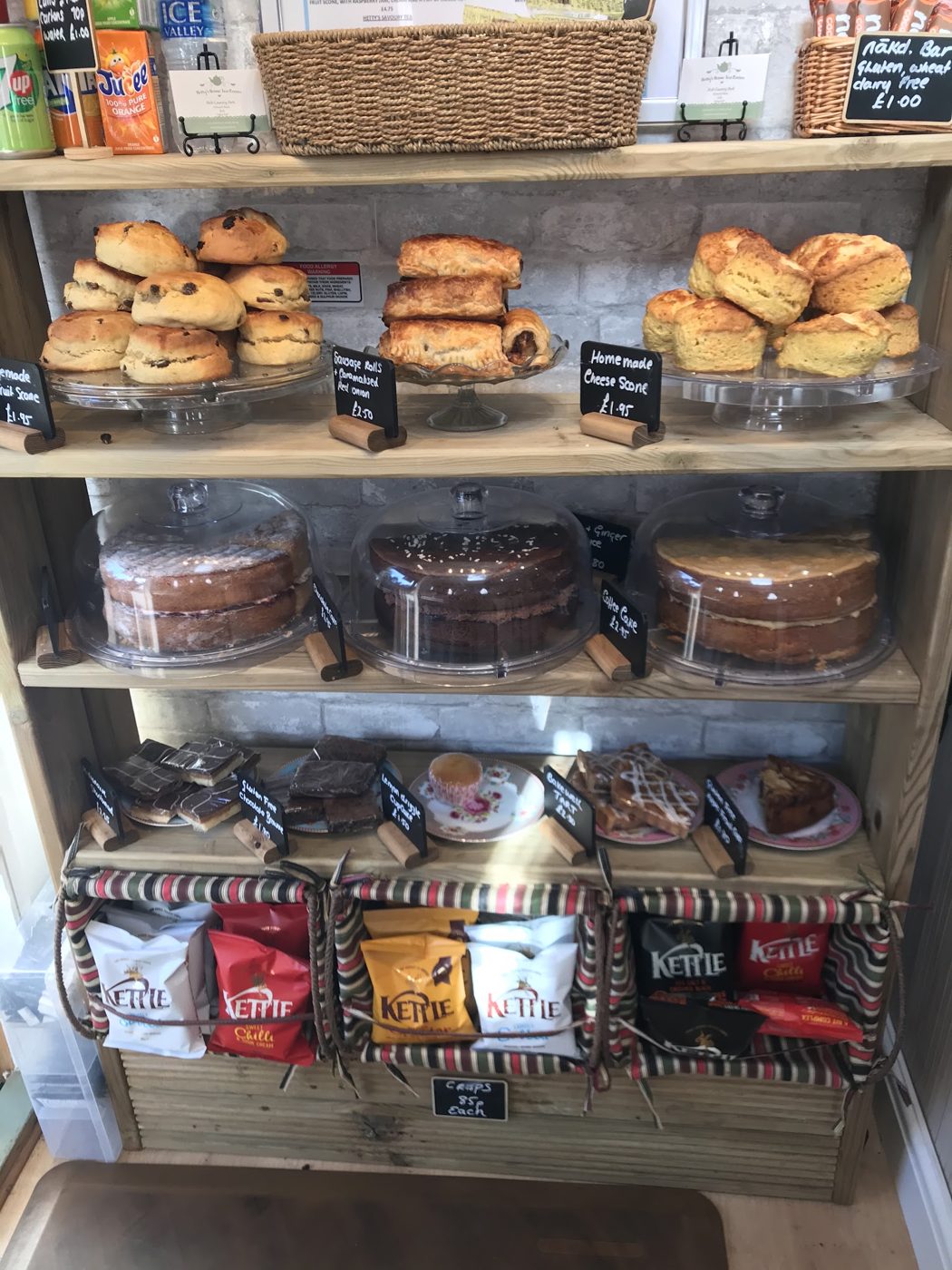 Shelves of scones, cakes and snacks
